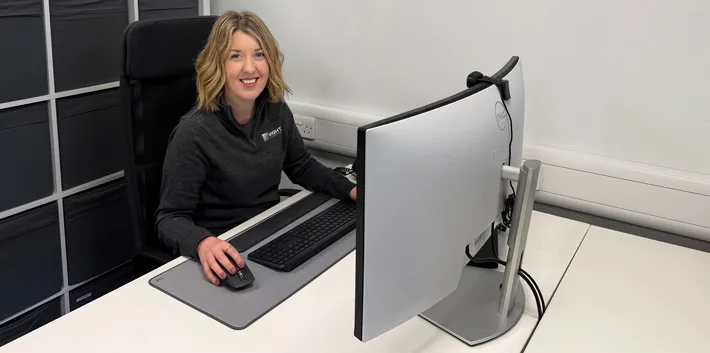 Kate Nordbruch at her desk